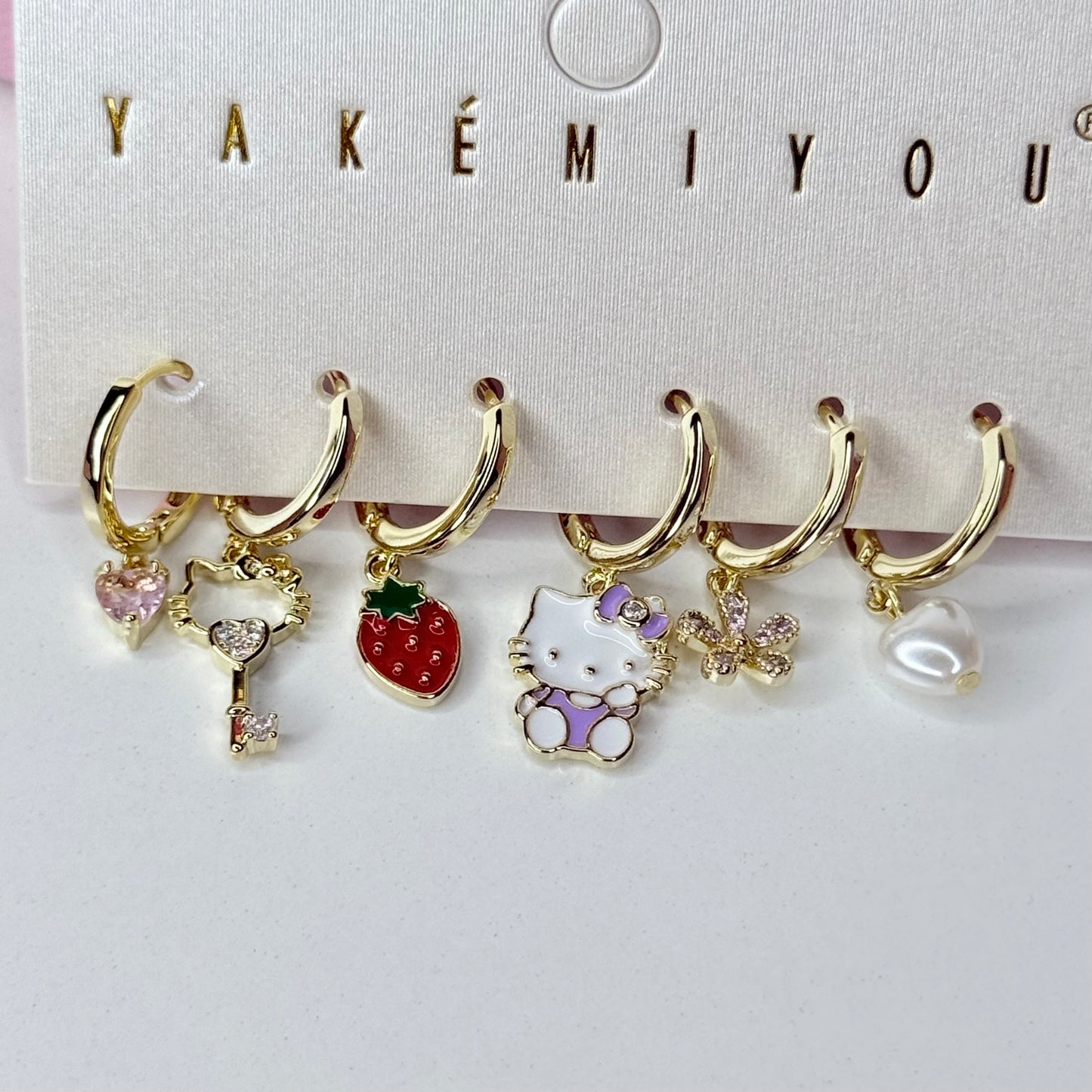 Aretes set Hello Kitty 6 pz CHAPA DE ORO 18k(U15)