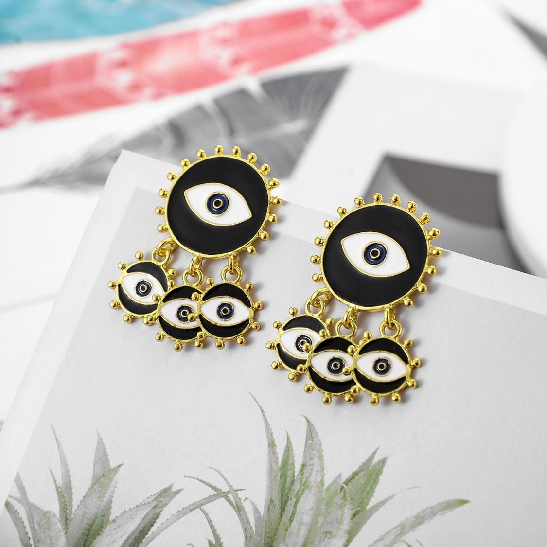 Aretes ojos negro(L213)