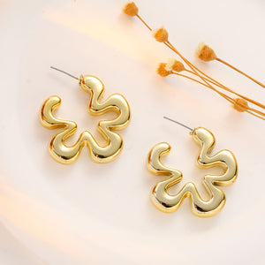 Aretes flor dorados(C178)