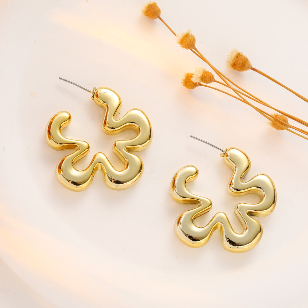 Aretes flor dorados(C178)