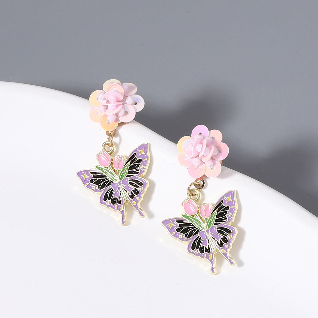 Aretes mariposas morado(D162)