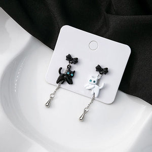 Aretes gato negro blanco(AA97)