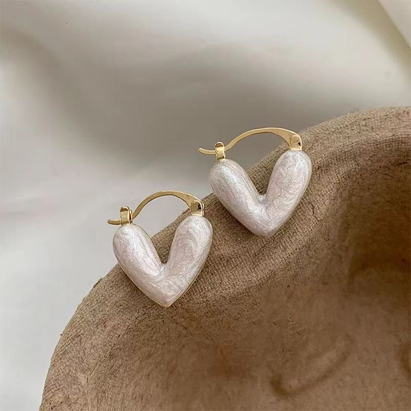 Aretes corazon blanco(U48)