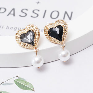 Aretes corazon negro(U47)