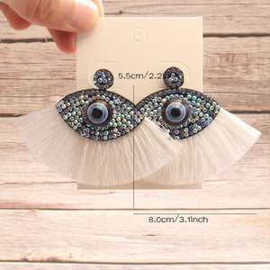 Aretes ojo borla blanco(K168)