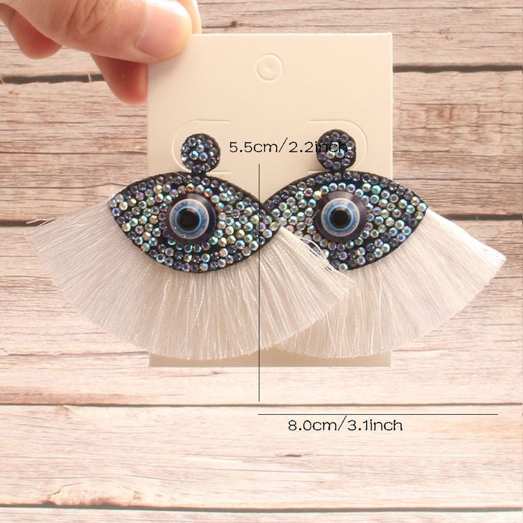 Aretes ojo borla blanco(K168)